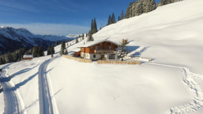 Отель Alpine Deluxe Chalet Wallegg-Lodge - Ski In-Ski Out, Хинтерглемм